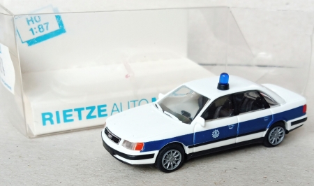 Rietze. Audi 100. Policie. Osobn auto. Mtko 1:87.  (E64)